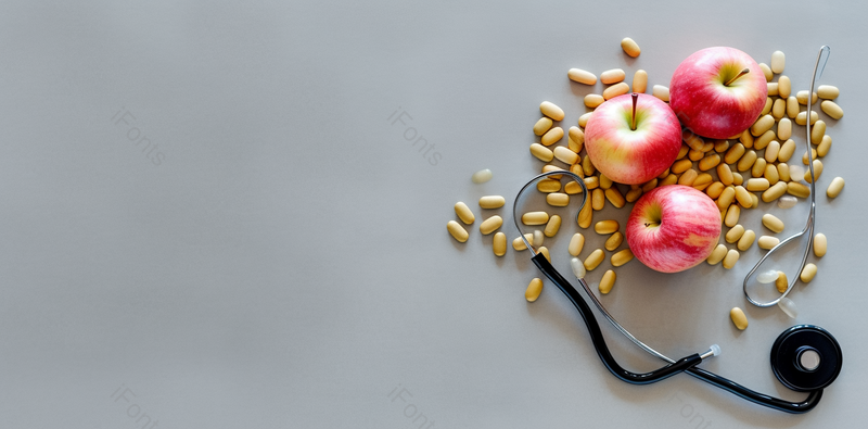 医疗设备鱼油药丸和苹果听诊器照片,高清,摄影图,摄影图片,图片大全,摄影图免费下载